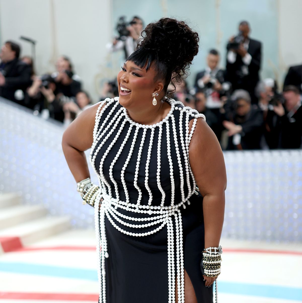 Lizzo Drips in Pearls at the 2023 Met Gala After Critiquing Last