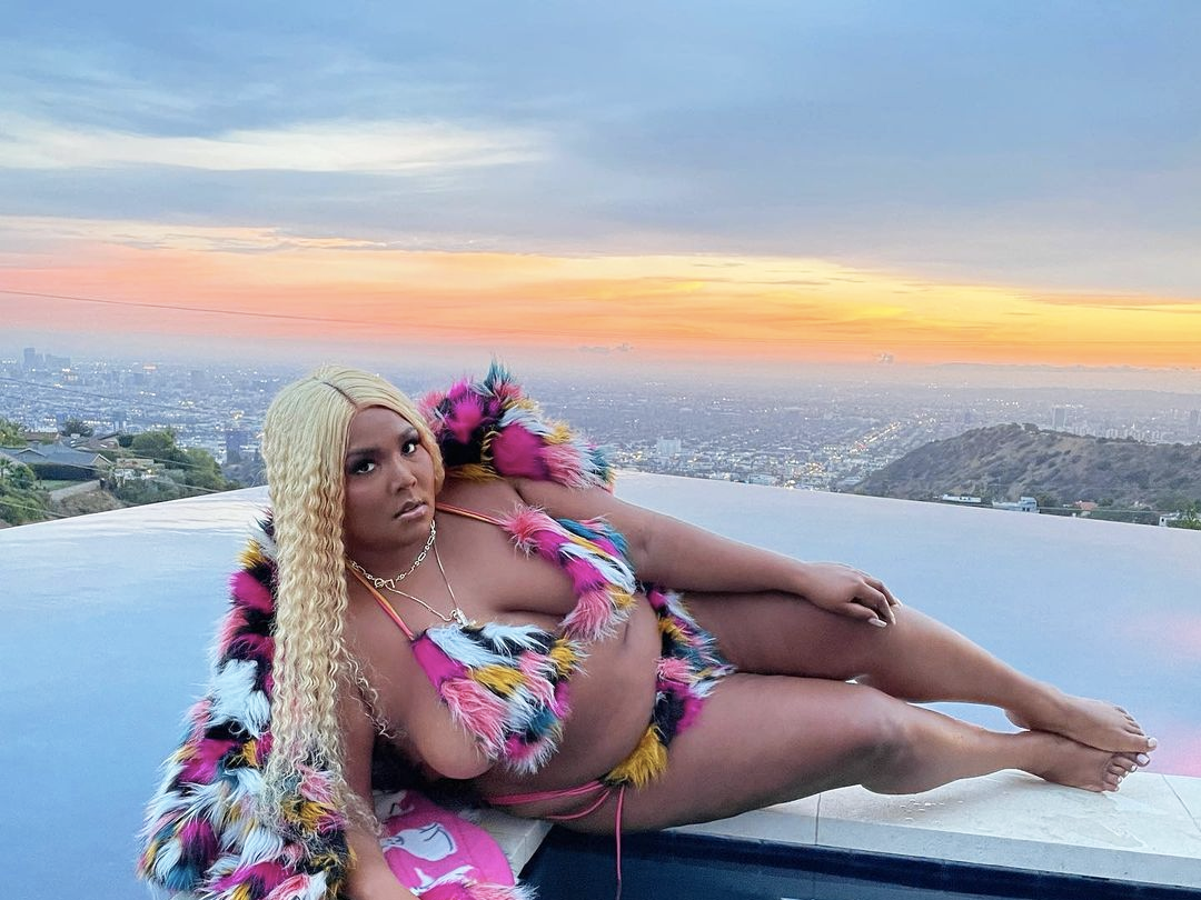 Lizzo twerks in a furry bikini and Facetunes her nipple out
