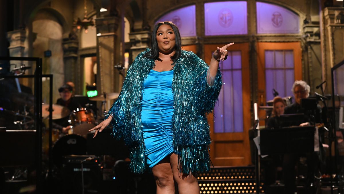 preview for Lizzo Jokes She's PREGNANT With Chris Evans' Baby After DM Flirting!