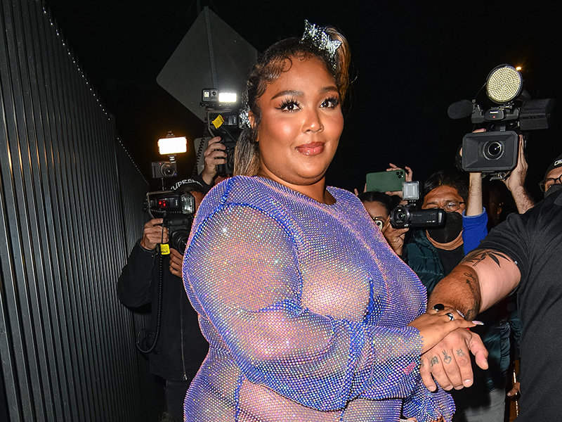 Lizzo wore a sparkly naked dress for Cardi B's birthday