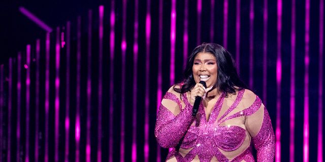 Lizzo Wears Stunning Sparkling Barbie Pink Catsuit at Kia Forum
