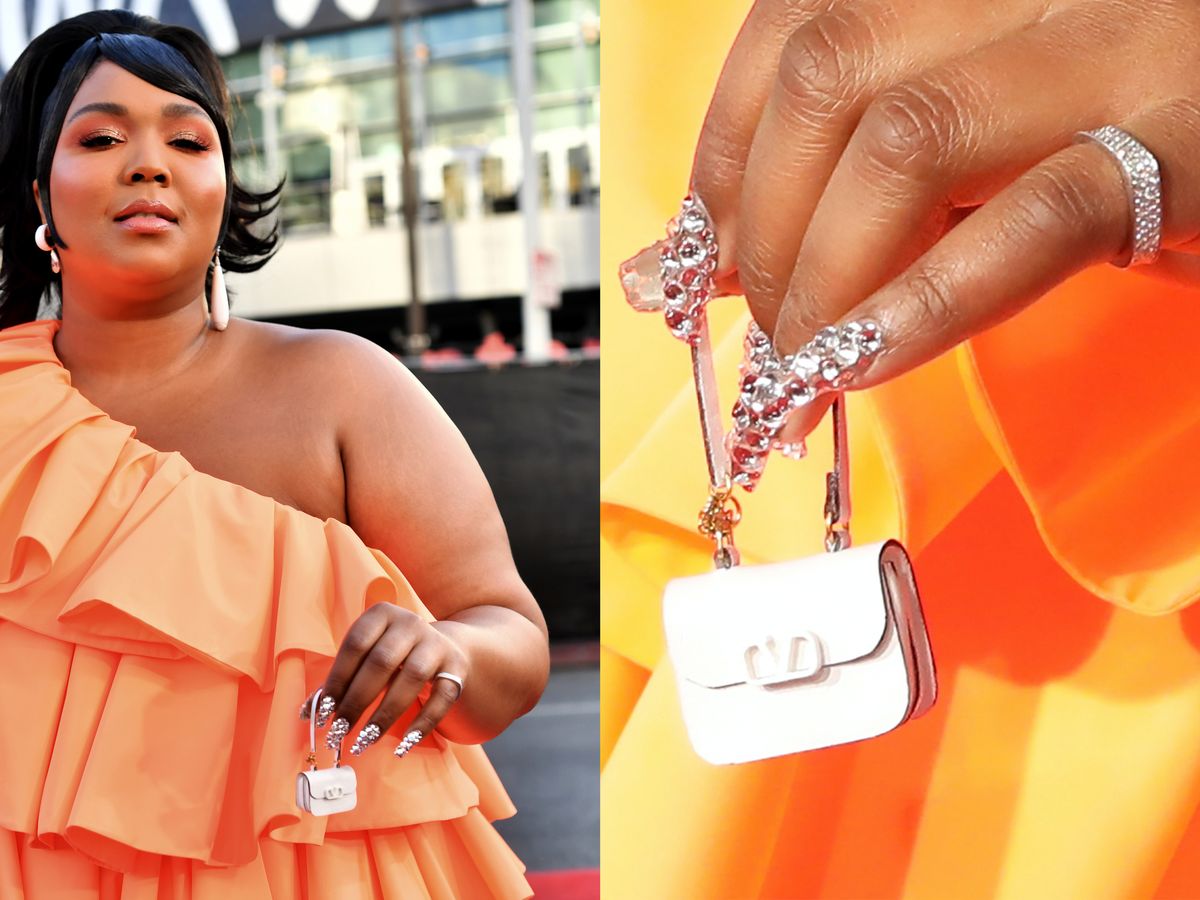 Lizzo brings the world's smallest handbag to American Music Awards