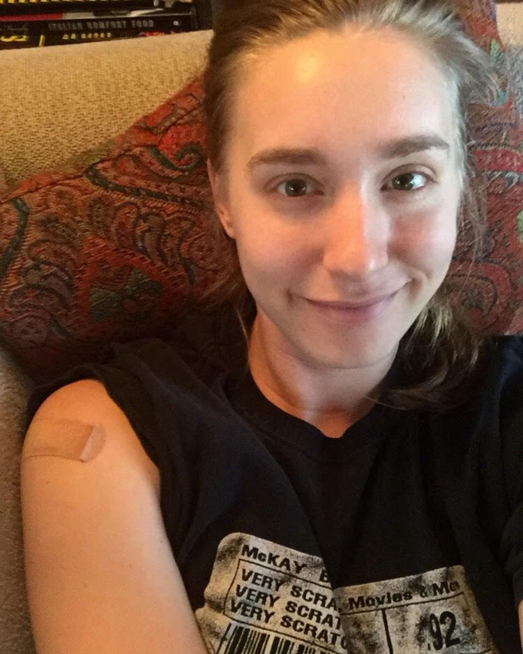 lauren krouse with a bandaid on her arm after shot 2