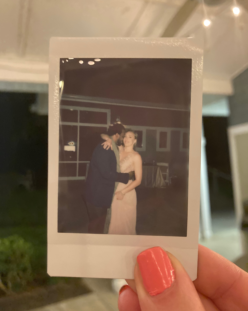 lauren krouse dancing at wedding in polaroid