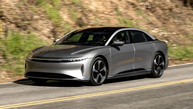 2024 Lucid Air 2024 lucid air driving on pavement