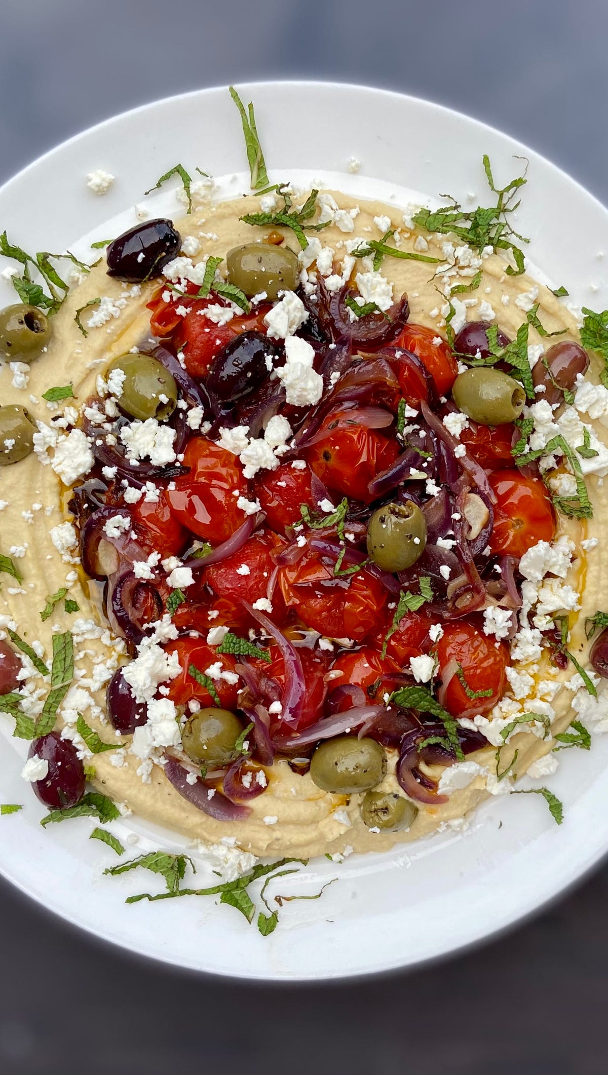 Video player poster image preview for Loaded Hummus with Roasted Tomatoes