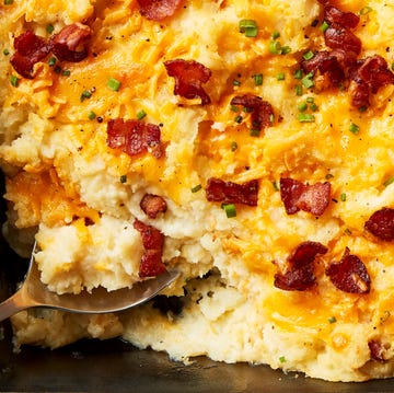 Loaded Mashed Potato Bake mashed potatoes baked in a casserole topped with cheese and bacon