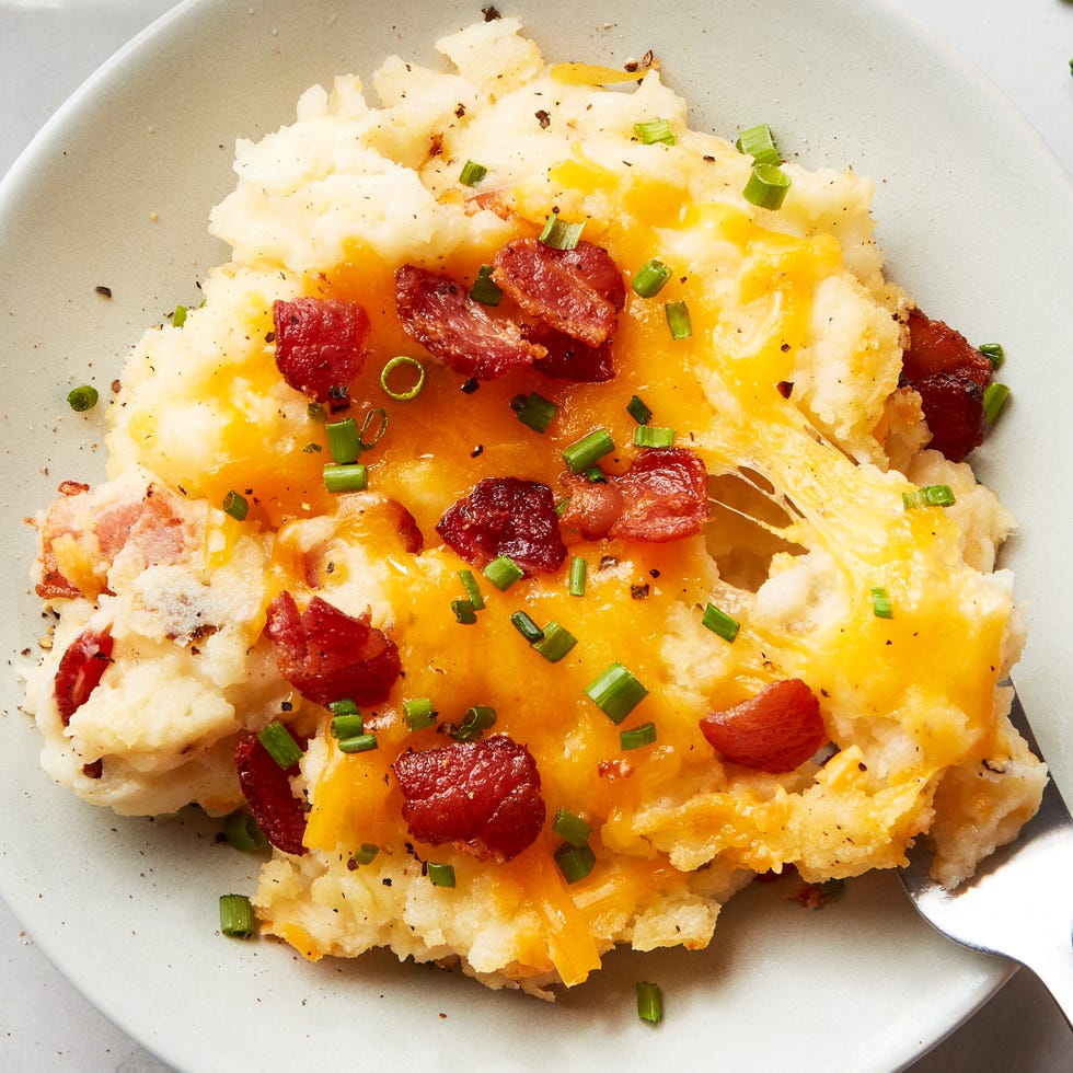 mashed potatoes baked in a casserole topped with cheese and bacon