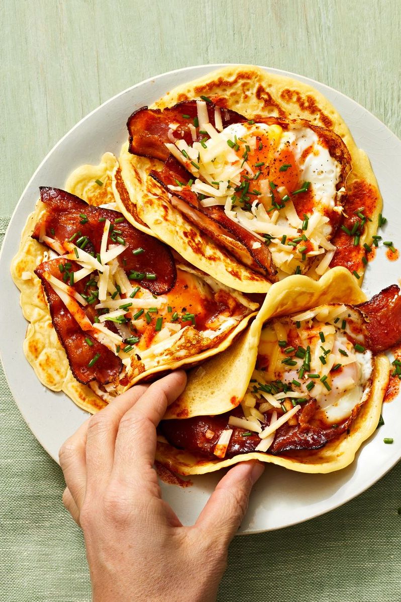 pancake tacos with bacon and eggs inside