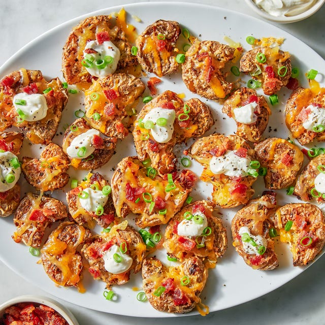 smashed potatoes with cheese, sour cream, bacon and chives