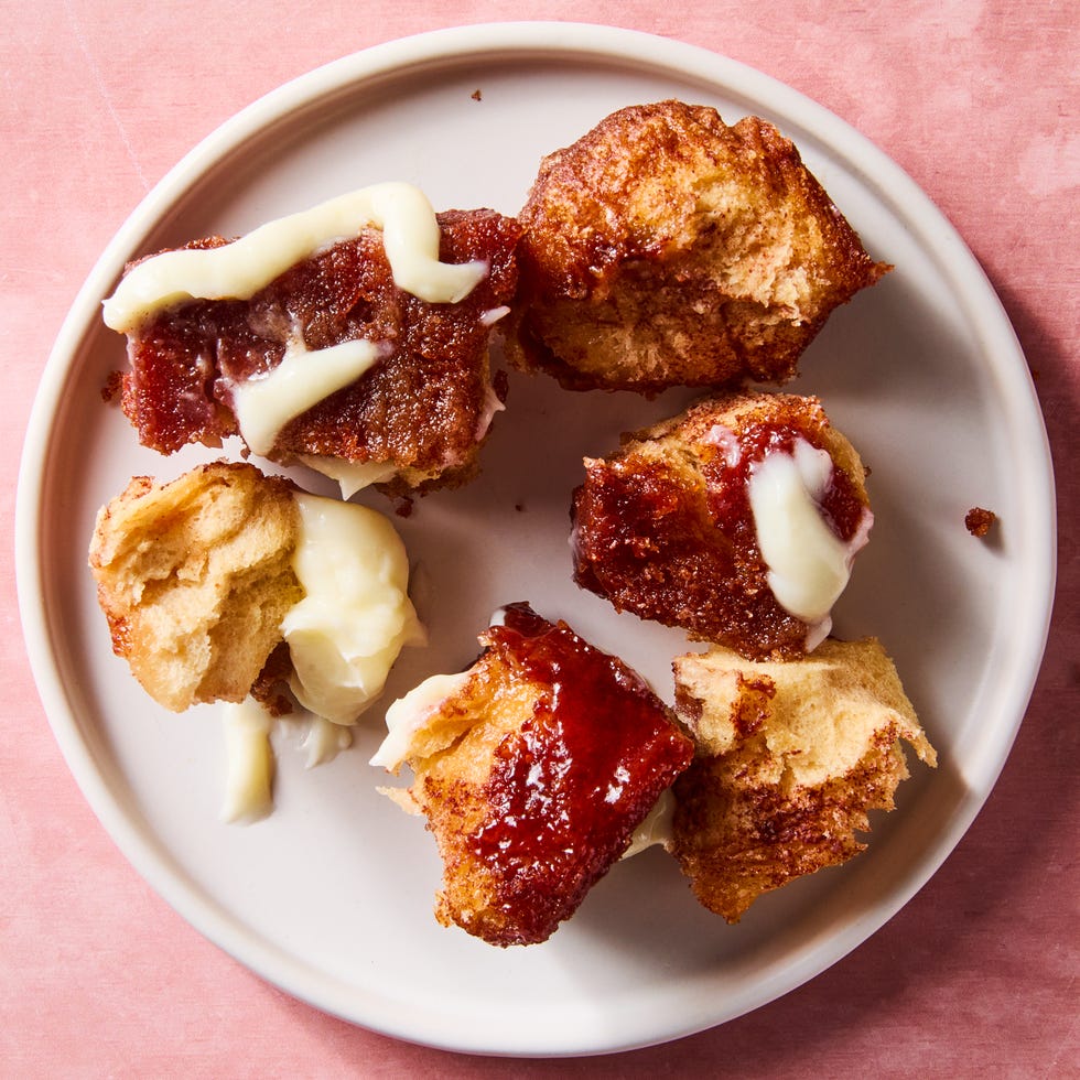 monkey bread made in a loaf pan topped with icing