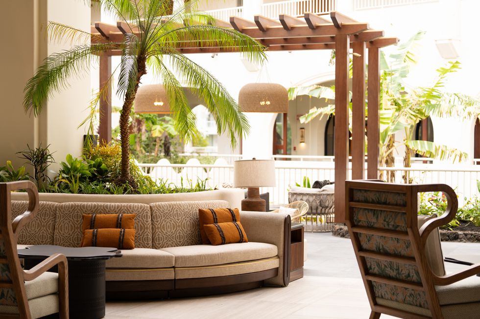 cozy seating and lush plantings in newly renovated lobby at fairmont kea lani 2024