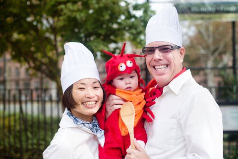 last minute halloween costume with baby in lobster onesie and parents in white chef hats and coats
