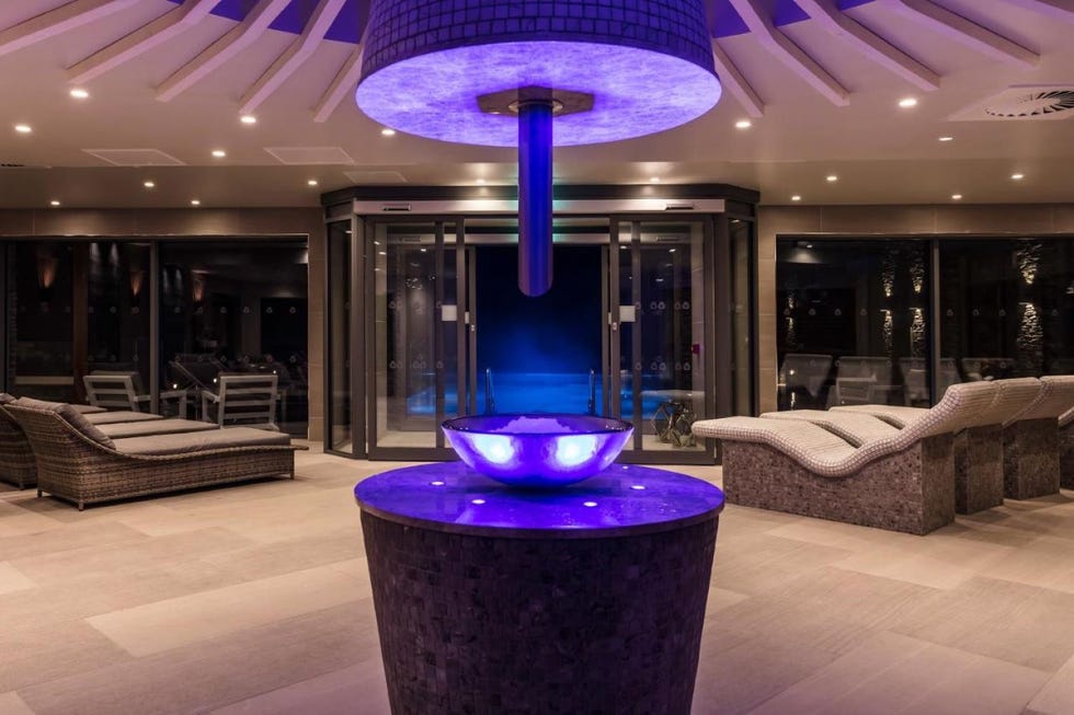 a room with loungers and wellness
