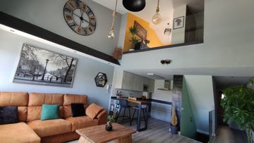 loft de diseño ecléctico con doble altura
