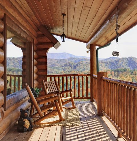 log cabin with a view of the smoky mountains