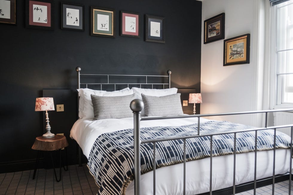 a bed with an iron frame at the pilot