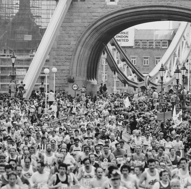 london marathon runners crossing tower bridge