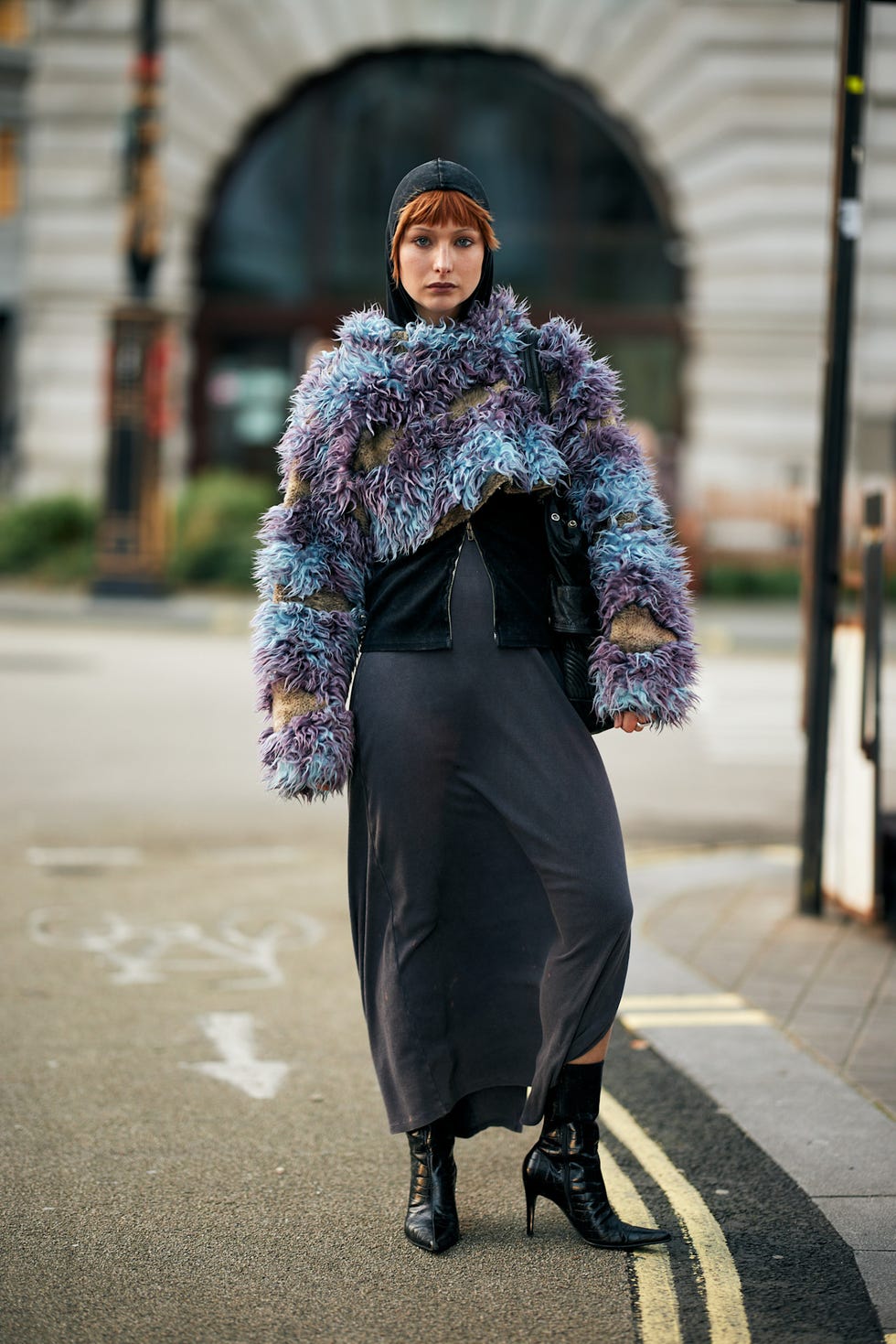 fashionable outfit featuring a textured oversized jacket and a long skirt best fringe haircuts london fashion week street style