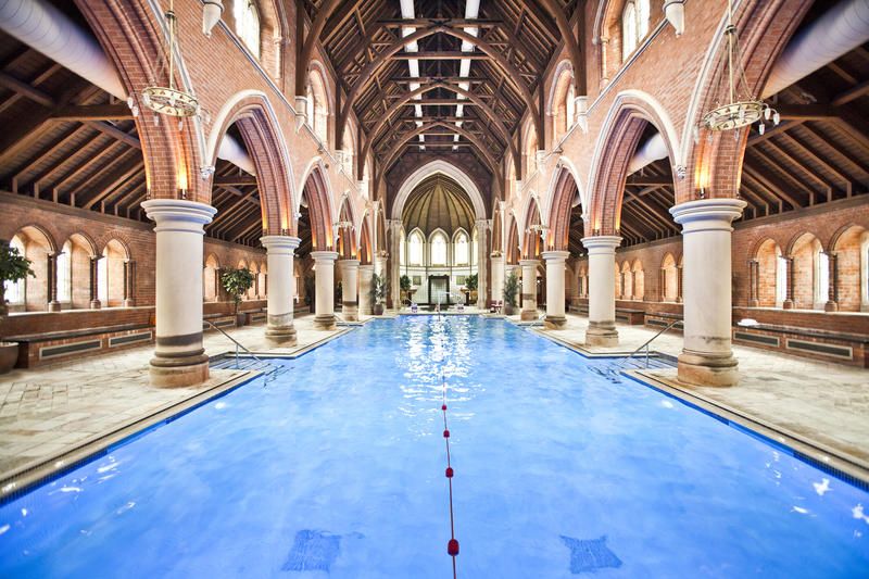 Blue, Architecture, Ceiling, Interior design, Reflection, Swimming pool, Hall, Arcade, Arch, Column, 