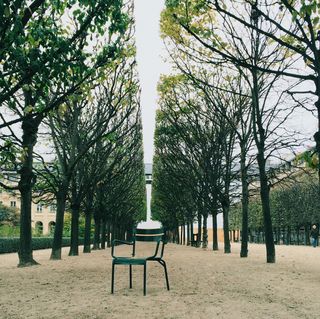 lone chair in jardin du palais royal, paris,france
