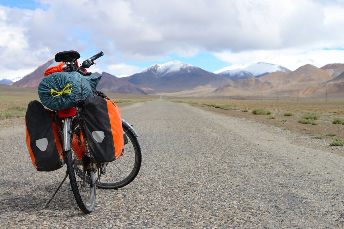 Long distance cycling on M41 Pamir Highway, Pamir Mountain Range, Tajikistan