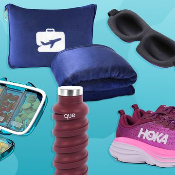 headphones, pill case, travel pillow and blanket, eye mask, face spray, hoka shoes, que water bottle