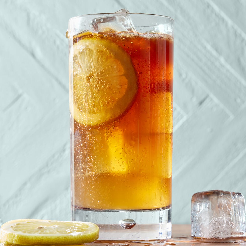 long island iced tea in a glass with lemon slices