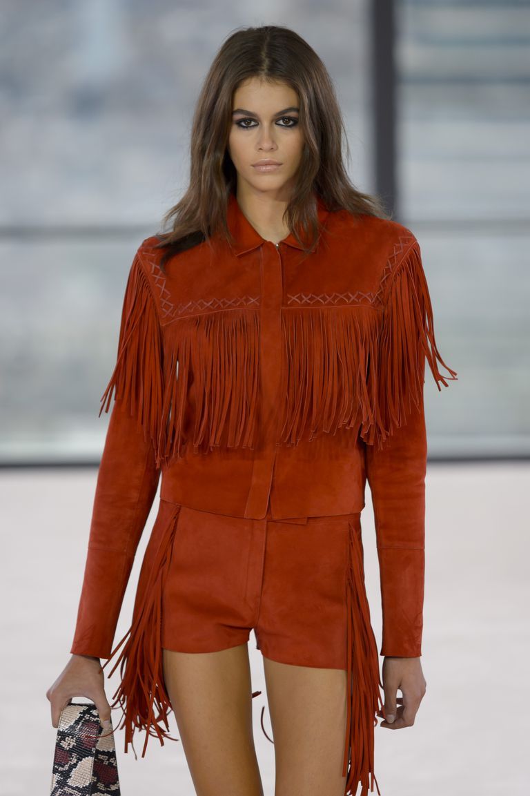 Kaia Gerber red fringe suede jacket Longchamp