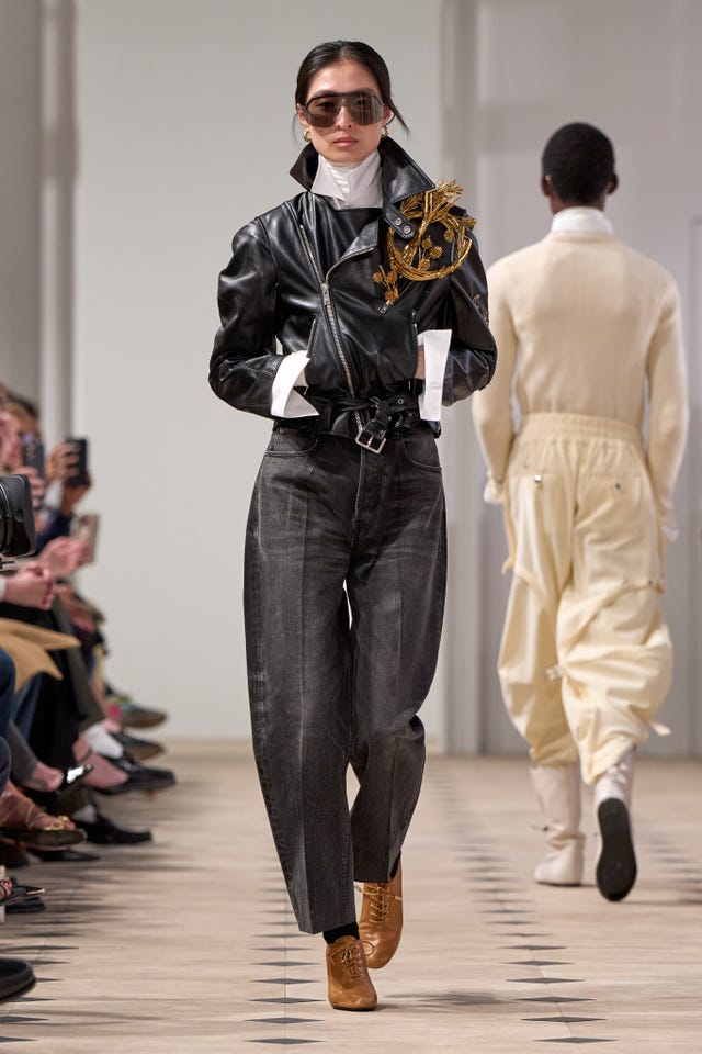 fashion model showcasing contemporary streetwear on the runway