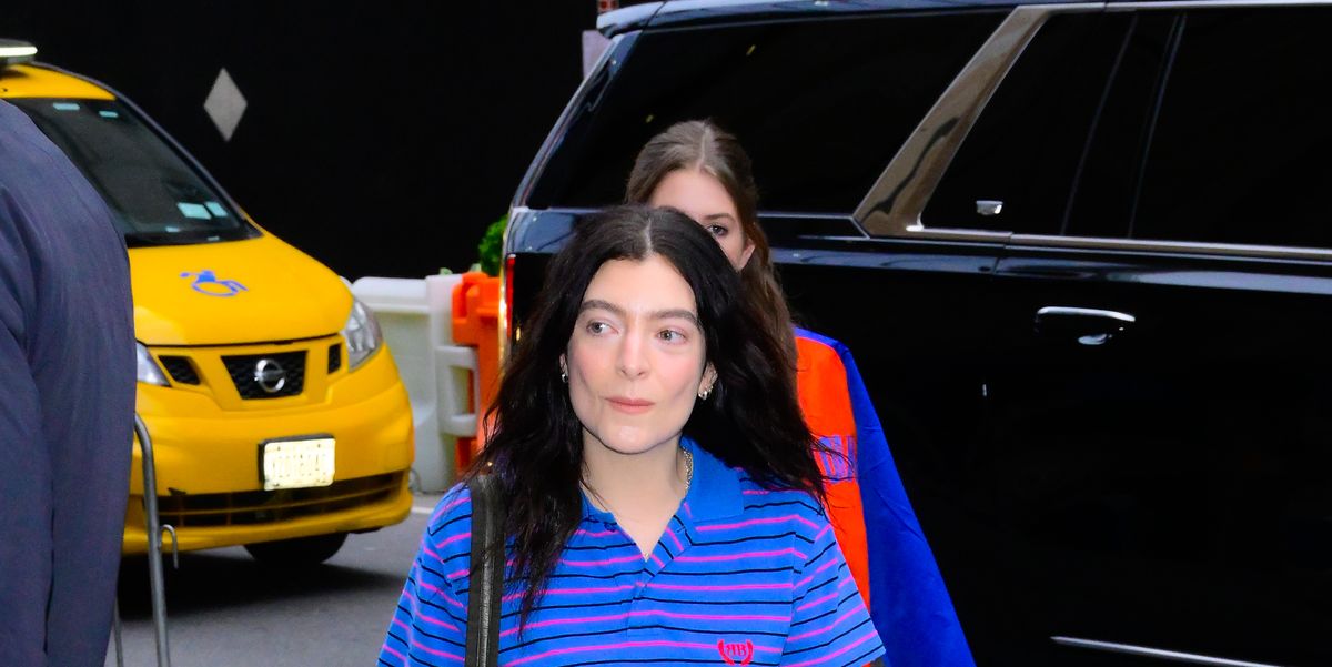 Lorde wore a striped Balenciaga polo to sit courtside at a Knicks game
