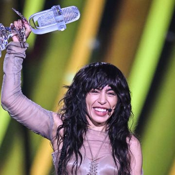 loreen holds the eurovision 2023 trophy after her win for sweden