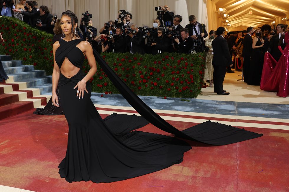lori harvey in a dramatic black gown at the 2022 met gala celebrating "in america an anthology of fashion" arrivals