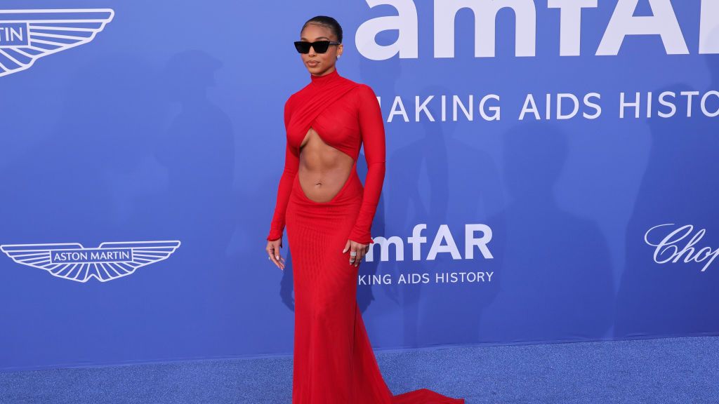 Lori Harvey Looks Regal in a Red Cut Out Gown at the amfAR Gala in