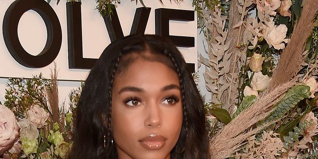 Watch Lori Harvey Grab Everyone's Attention in a See-Through Shirt and Mini  Skirt