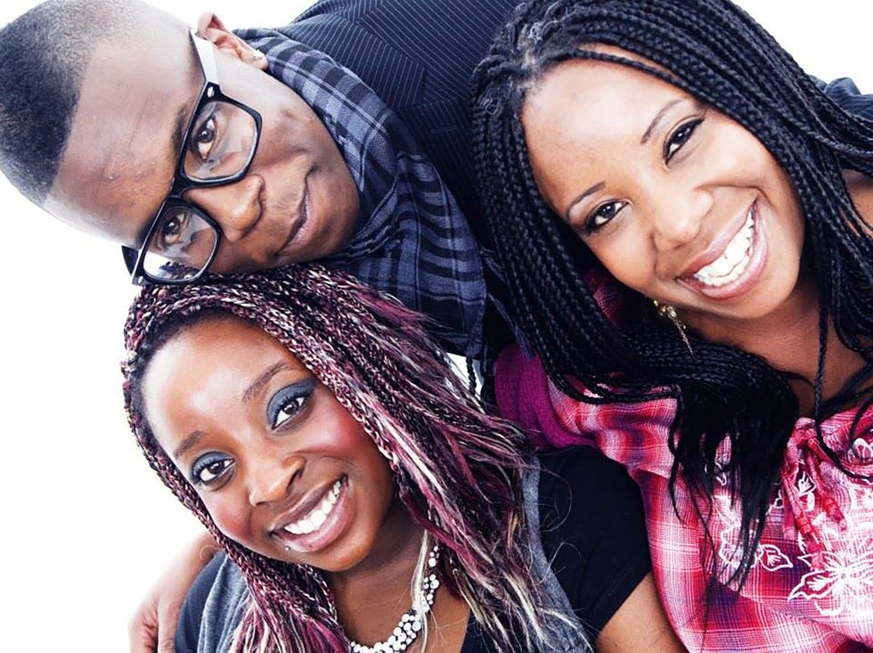 a group of people posing for the camera