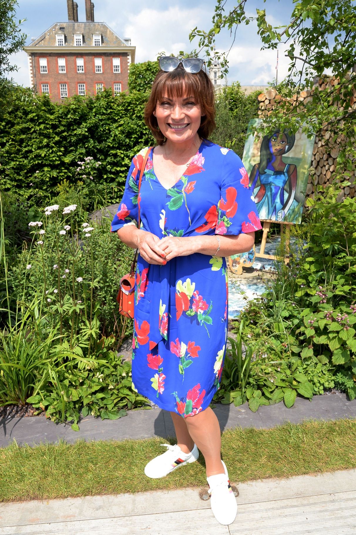 Lorraine Kelly rocks bold floral Phase Eight dress and Topshop shoes