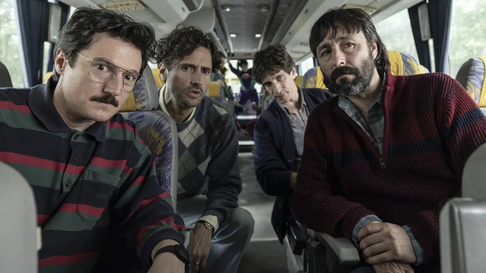 a group of four individuals on a bus