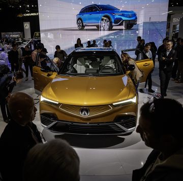crowd gathers around acura all electric zdx type s at the 2023 la auto show