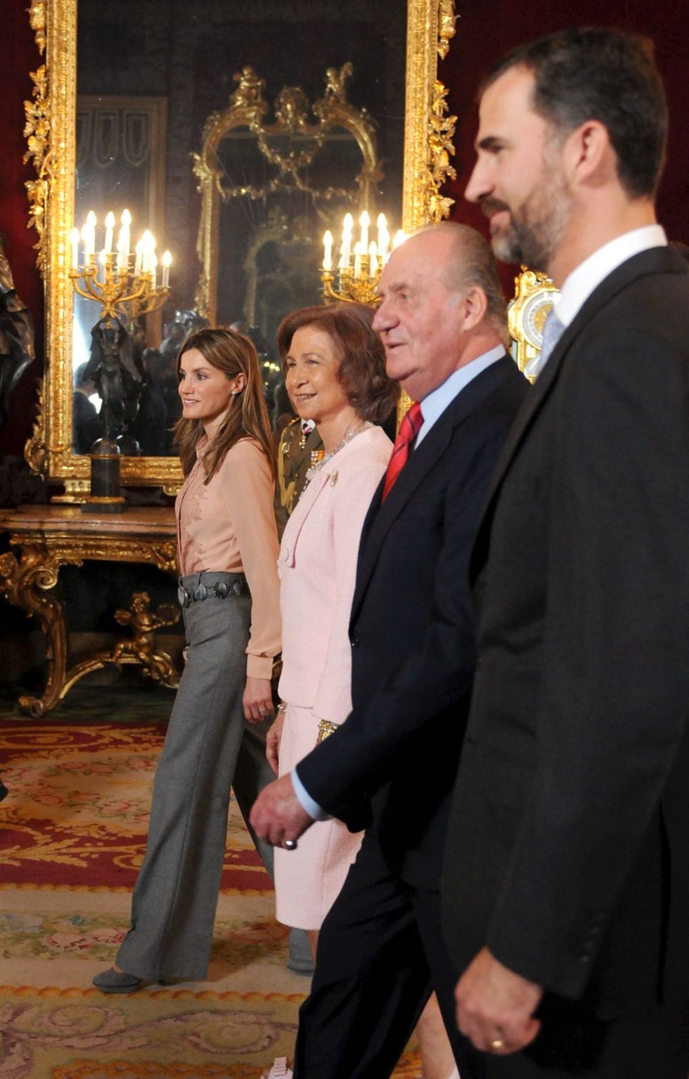 a group of people standing in a room