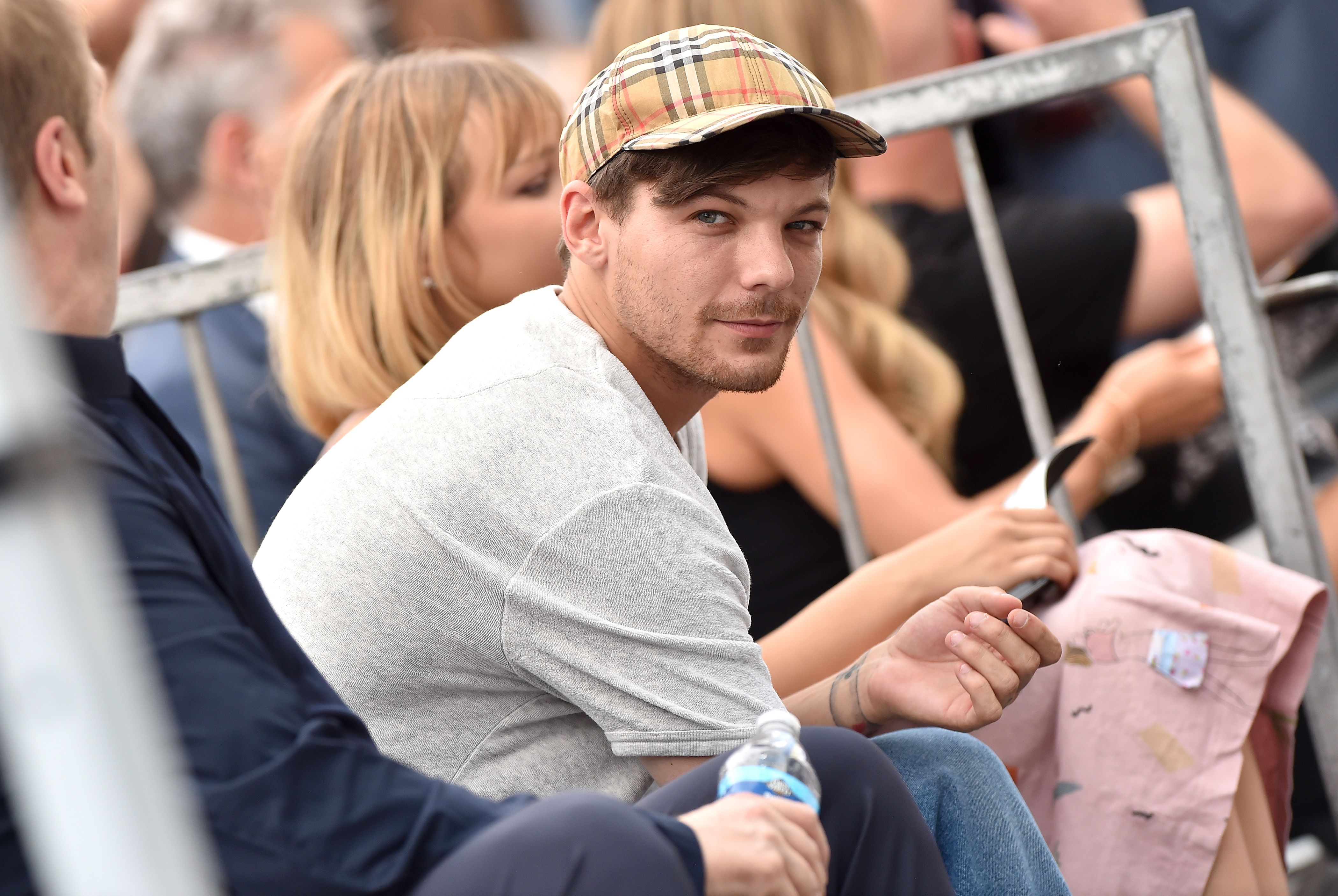 Louis Tomlinson opens up about the deaths of his mom and sister