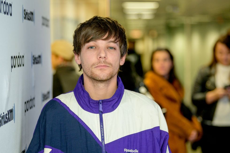 Louis Tomlinson steps out in London after Twitter spat