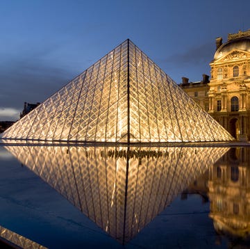 Pyramid Entrance to Louvre Reflected in Pool louvre loreal beauty exhibition