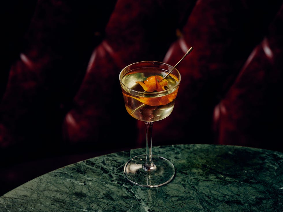 a glass with a drink in it