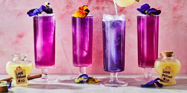 purple and pink cocktail with flowers