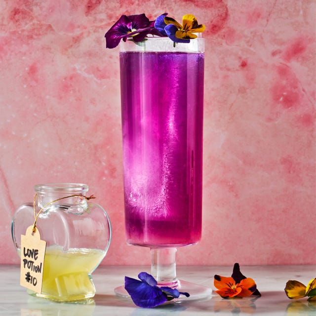 purple and pink cocktail with flowers