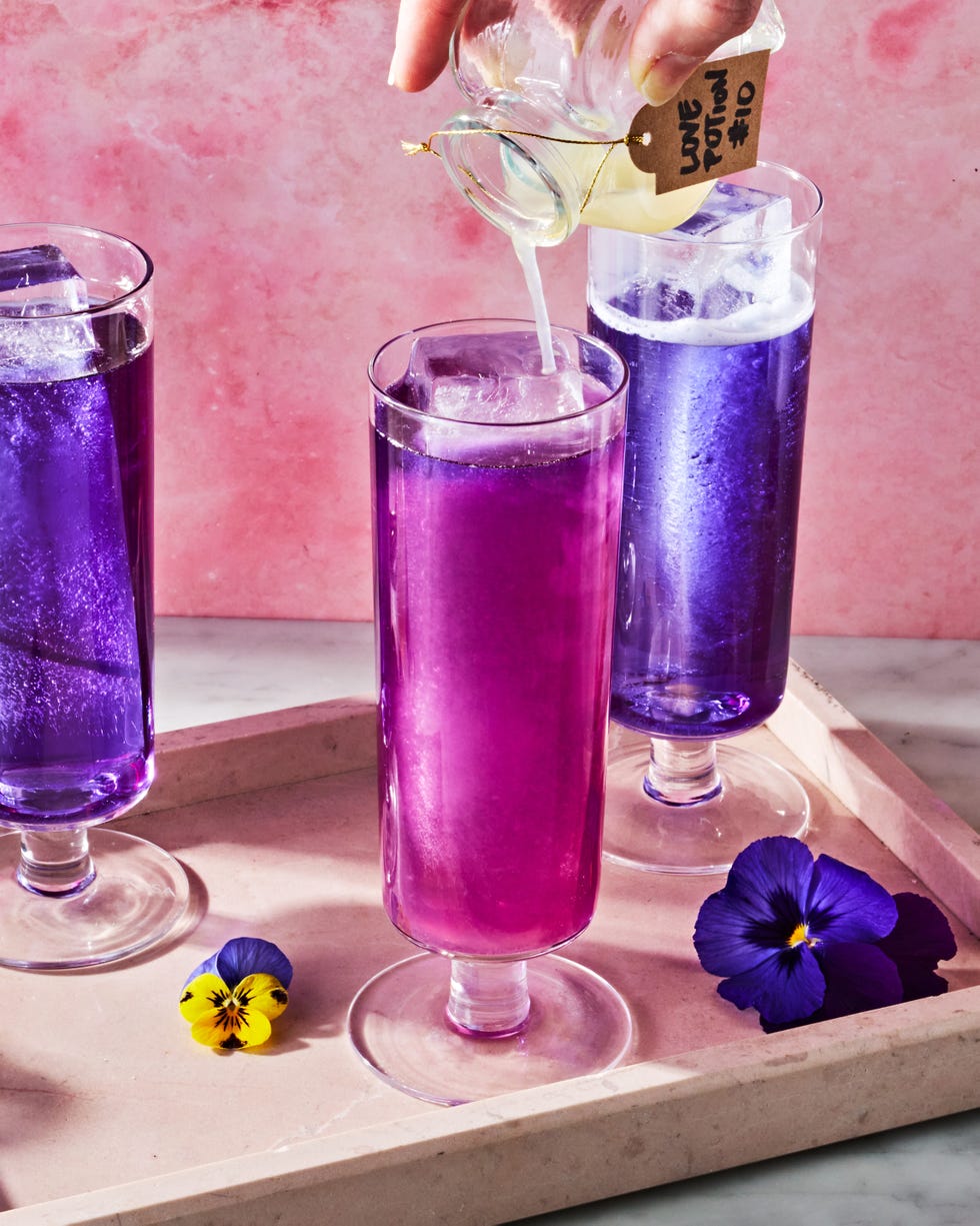 purple and pink cocktail with flowers