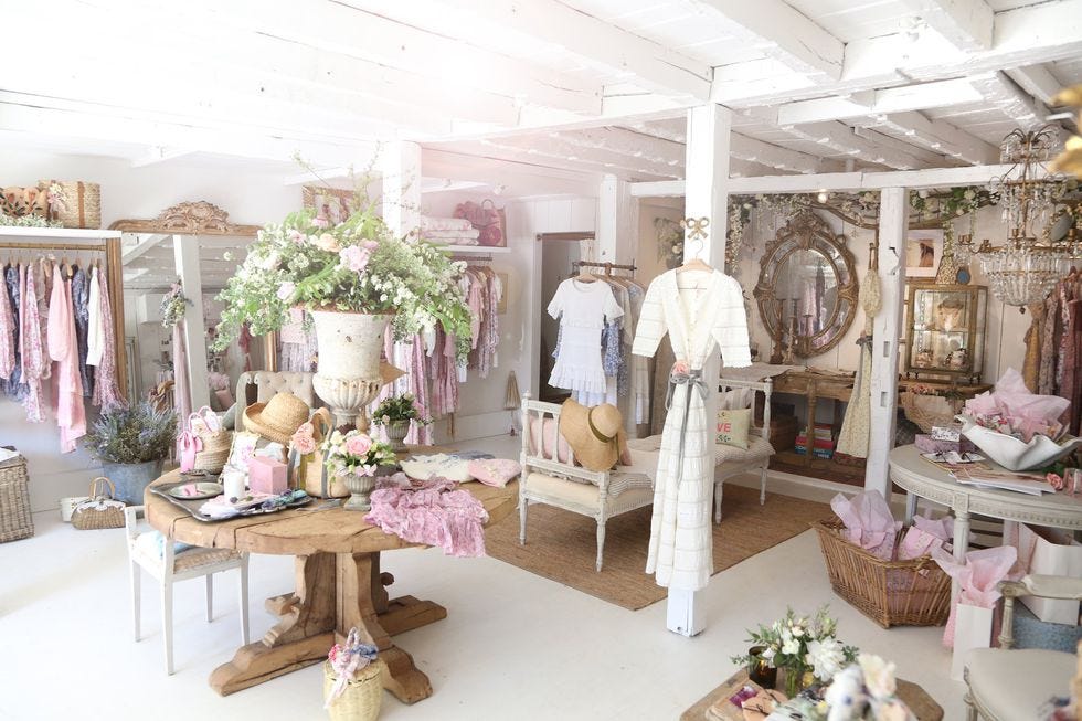 Room, Interior design, Furniture, Pink, Building, Boutique, Table, Living room, House, Home, 