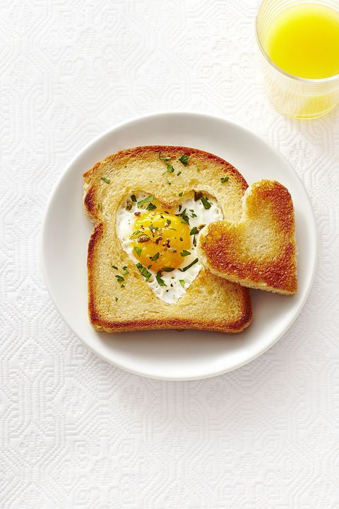 egg toast with a cut out heart in the middle