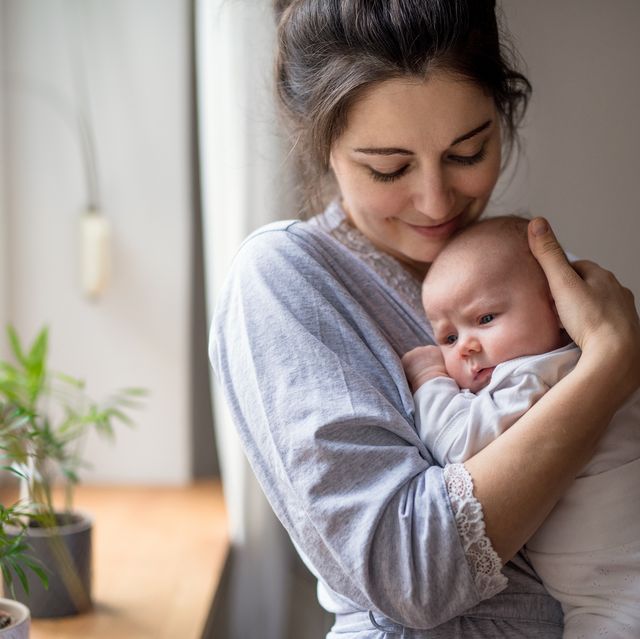 https://hips.hearstapps.com/hmg-prod/images/loving-and-affectionate-mother-holding-newborn-baby-royalty-free-image-1649363015.jpg?crop=0.668xw:1.00xh;0.277xw,0.00240xh&resize=640:*